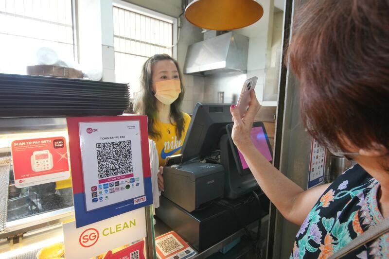 狮城可用“一触即通”付款 用户反应淡摊贩多不知