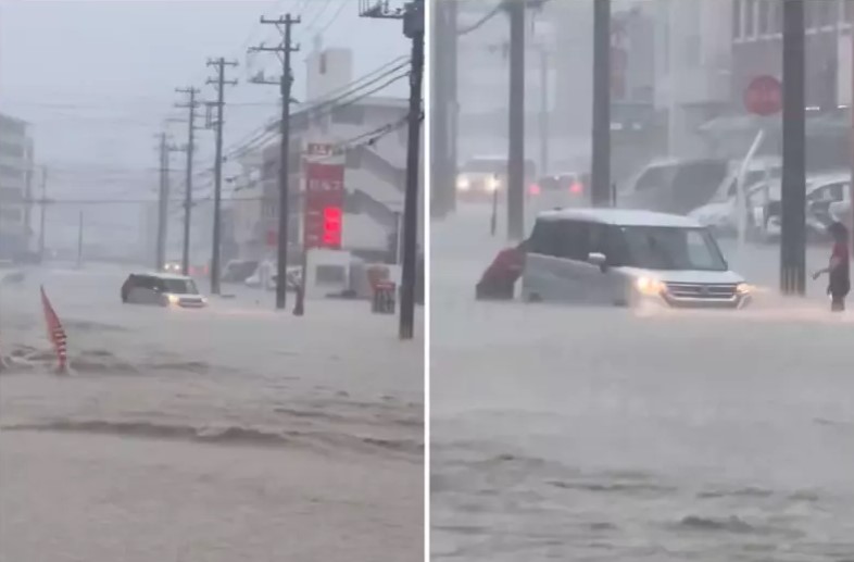 【视频】日本冲绳“破纪录大雨” 淹水深至大腿民众涉水推车