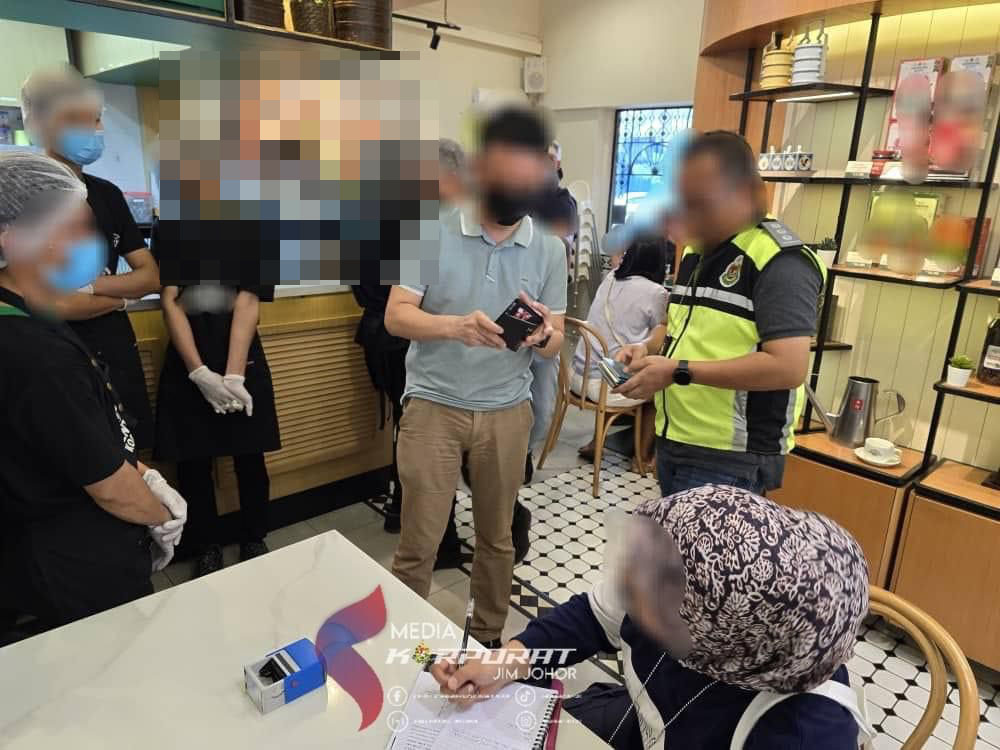柔移民局扫荡4咖啡店 捕145非法外籍员工