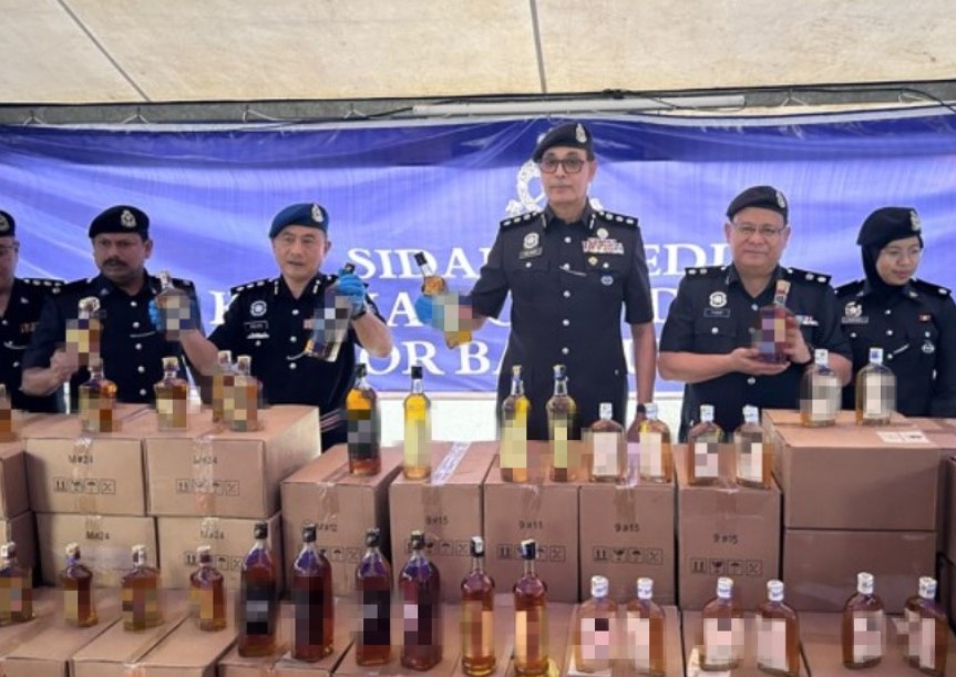 突击工厂捣破假酒集团 警起获125万逮捕首脑3人