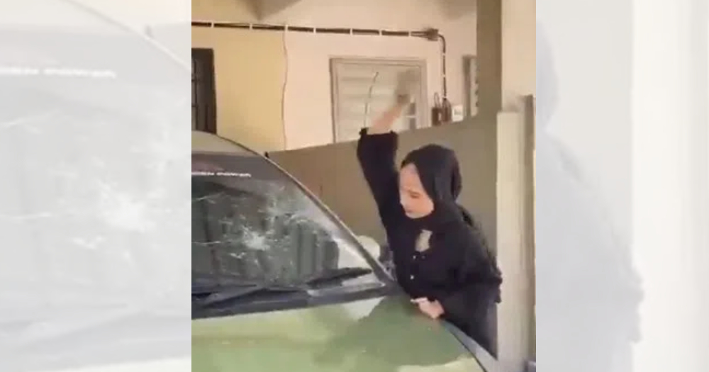 【视频】疑不甘欠车贷被拖车 车主家属怒砸休旅车