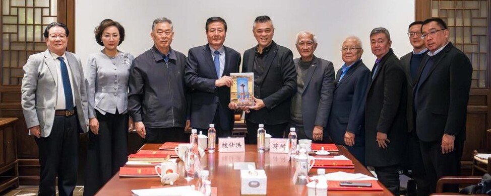 隆广义访北京英促会