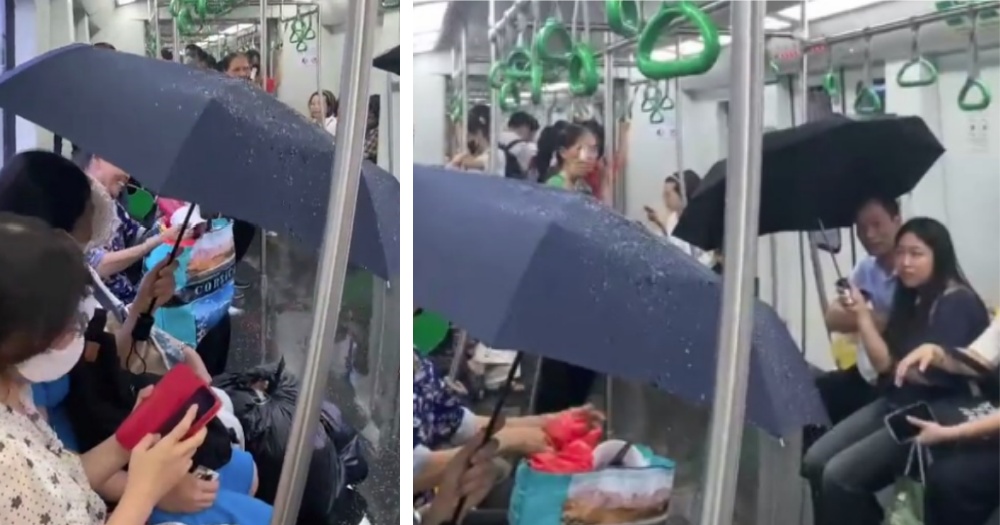 越南地铁列车漏水 乘客车厢内撑伞