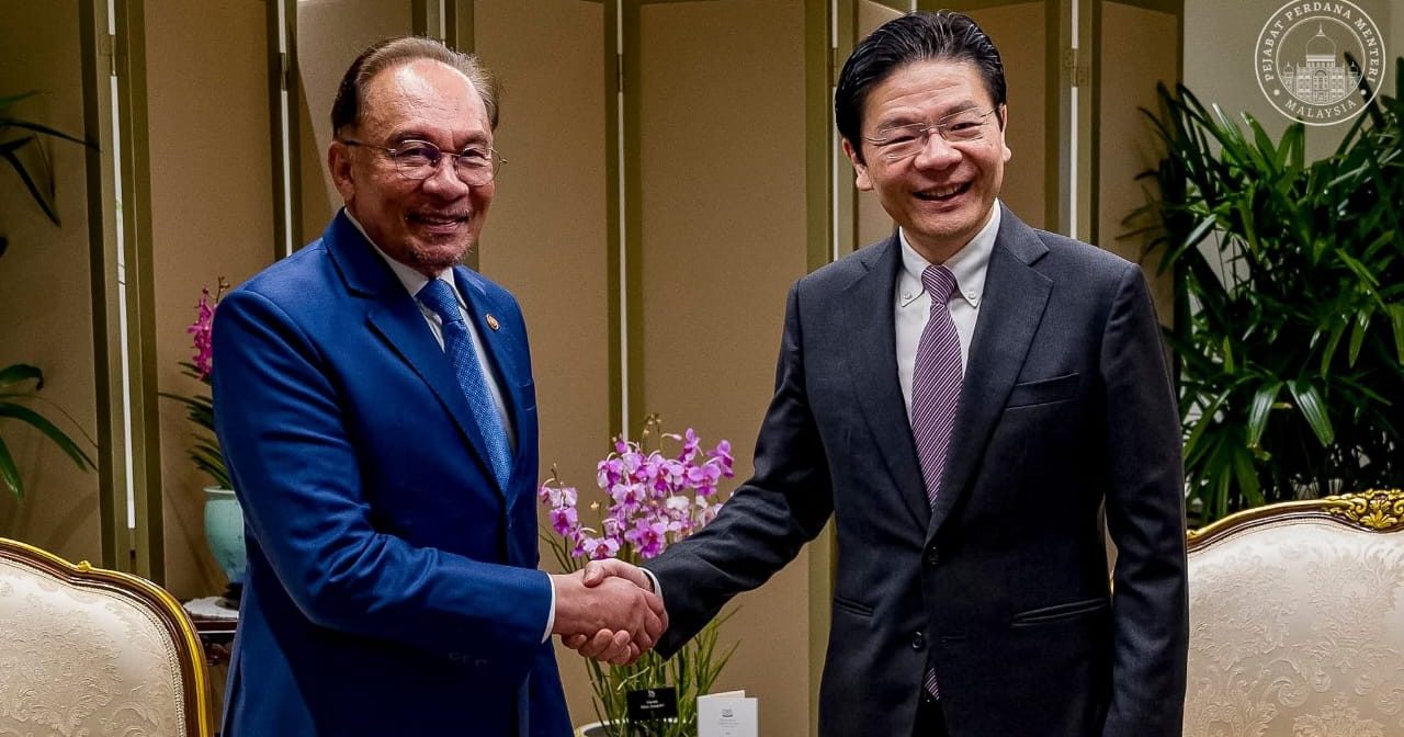 回国前会晤黄循财 首相完成新加坡访问