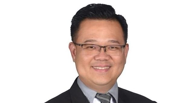 甘世豪:执法过严 取缔超载影响建筑业运作